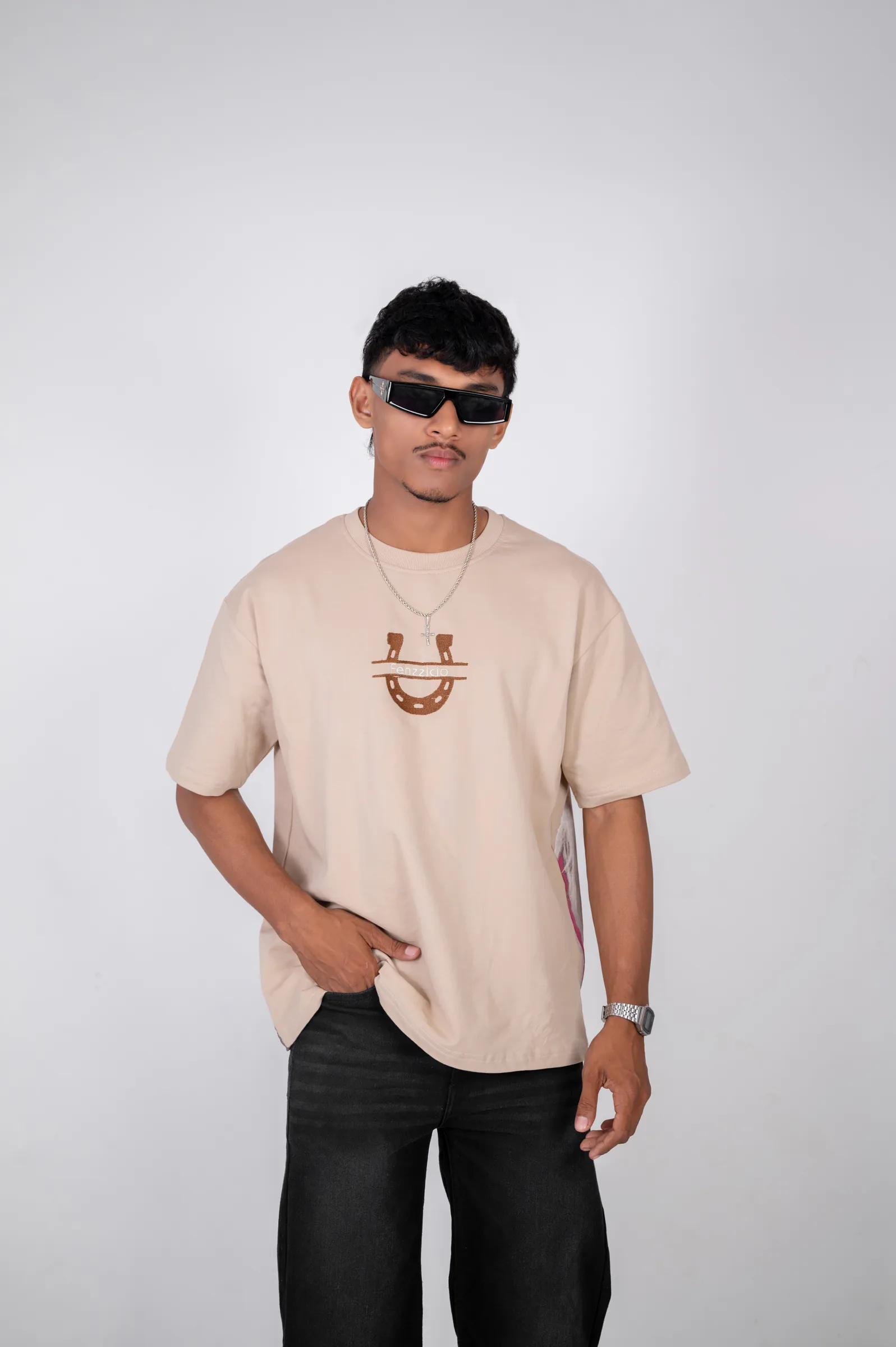 The Horse Love Tee front view on model with embroidered horseshoe chest motif