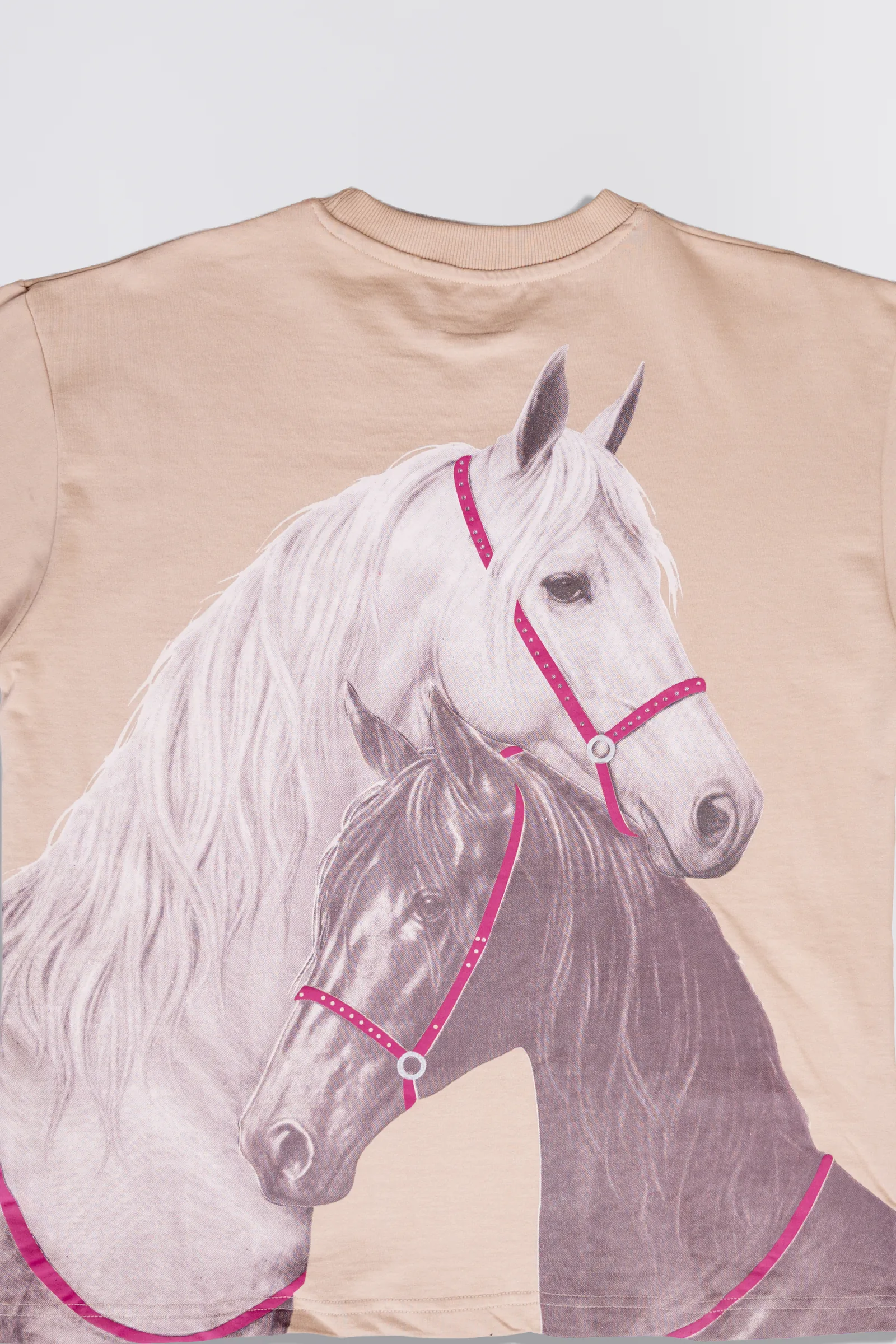 Back print detail: two horses with raised puff print halter straps